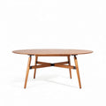 Oval wooden coffee table with black metal accents 150 x 75 x 75cm